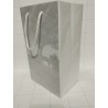 Bolsa forrada con papel de china blanco, fondo con impresión